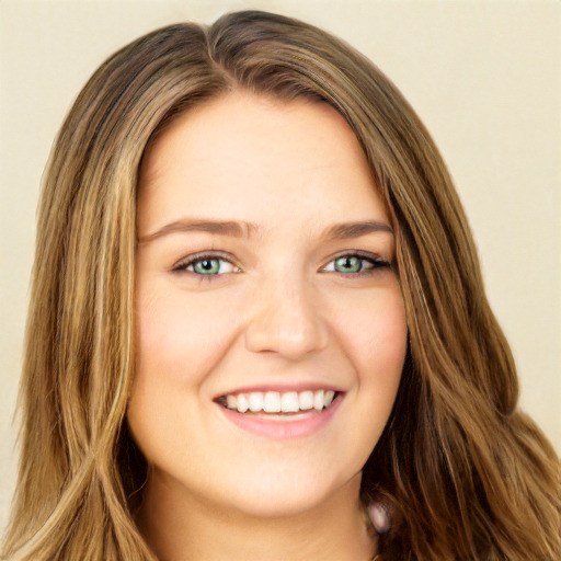 Joyful white young-adult female with long  brown hair and green eyes