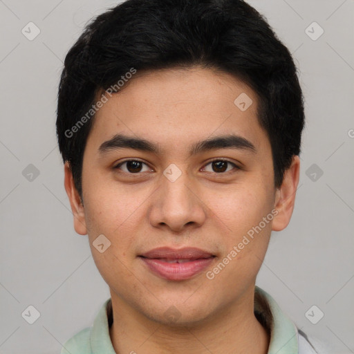 Joyful asian young-adult male with short  brown hair and brown eyes