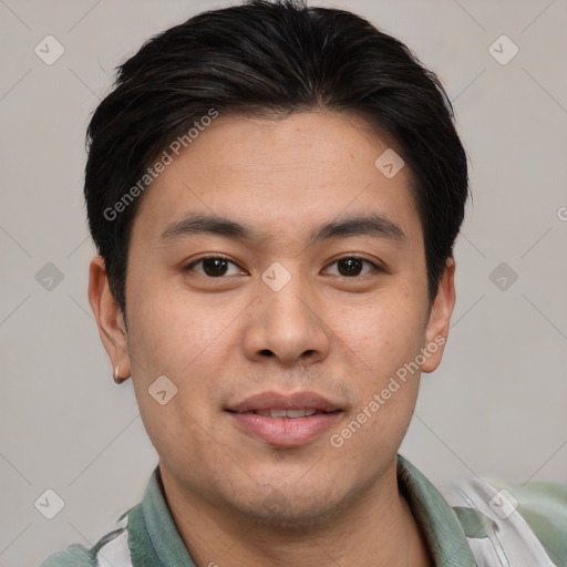 Joyful asian young-adult male with short  brown hair and brown eyes