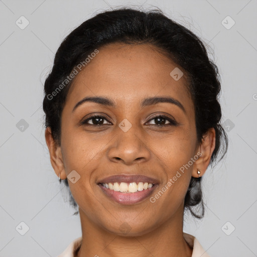 Joyful latino young-adult female with medium  brown hair and brown eyes