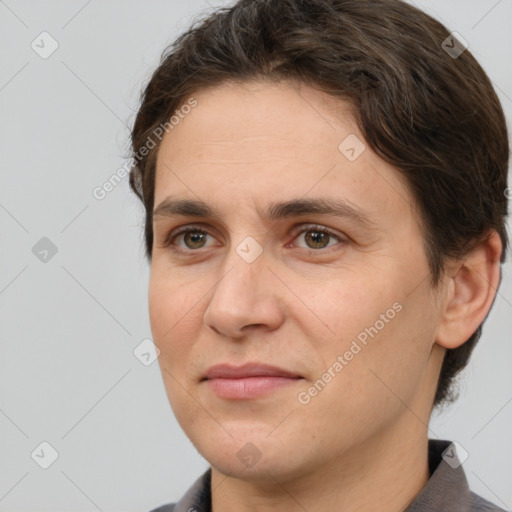 Joyful white adult female with short  brown hair and brown eyes