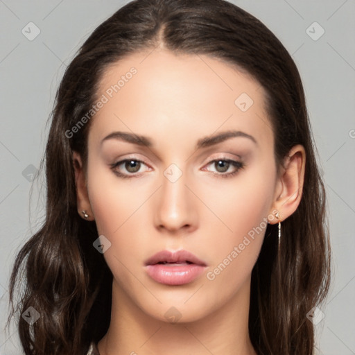 Neutral white young-adult female with long  brown hair and brown eyes