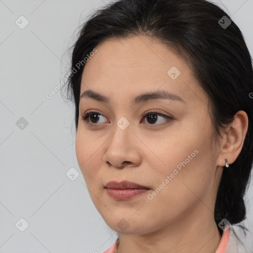 Joyful white young-adult female with medium  brown hair and brown eyes