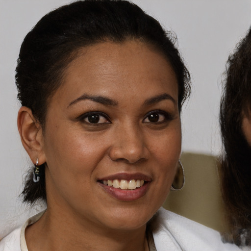 Joyful white young-adult female with medium  brown hair and brown eyes