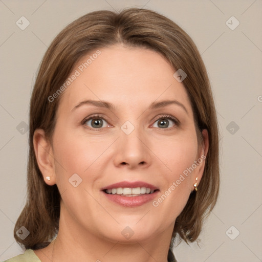 Joyful white adult female with medium  brown hair and grey eyes