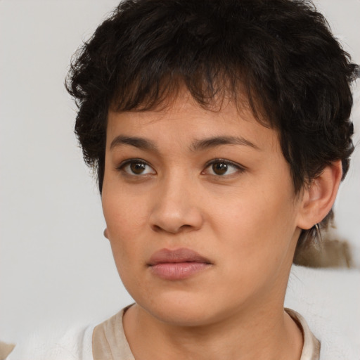 Neutral white young-adult female with short  brown hair and brown eyes