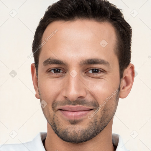 Joyful white young-adult male with short  brown hair and brown eyes