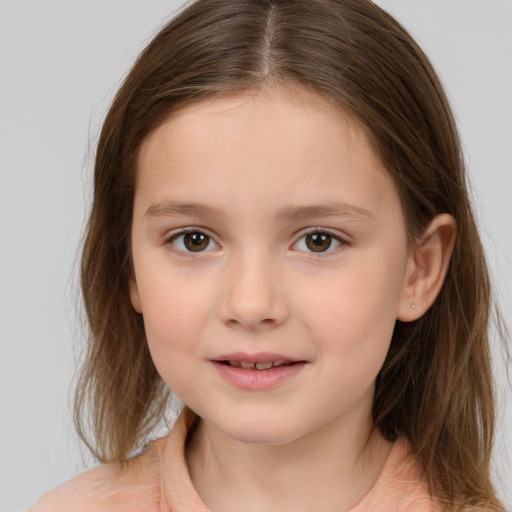 Joyful white child female with medium  brown hair and brown eyes