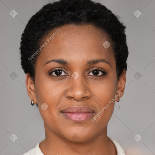 Joyful black young-adult female with short  brown hair and brown eyes