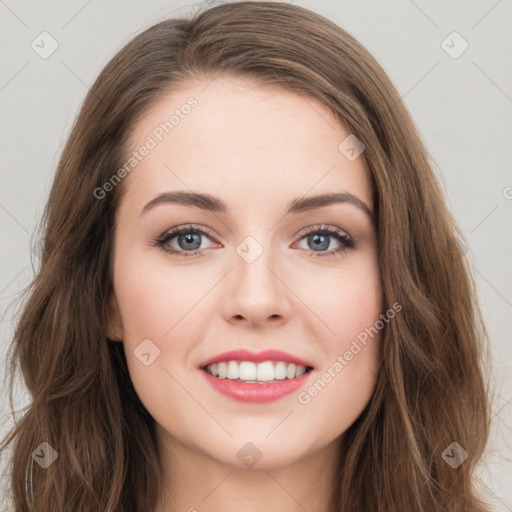 Joyful white young-adult female with long  brown hair and green eyes