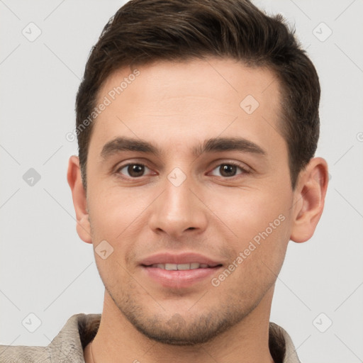 Joyful white young-adult male with short  brown hair and brown eyes