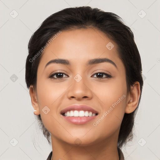 Joyful latino young-adult female with long  black hair and brown eyes