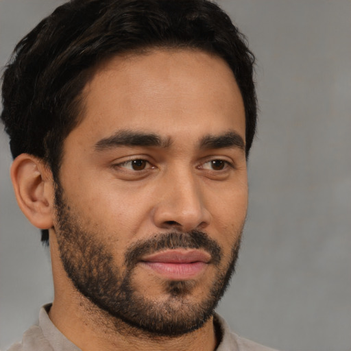 Neutral latino young-adult male with short  brown hair and brown eyes