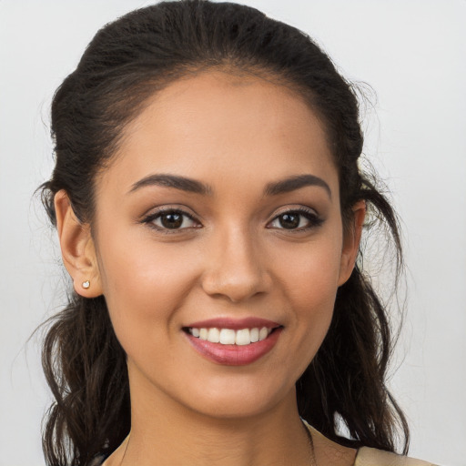 Joyful white young-adult female with medium  brown hair and brown eyes