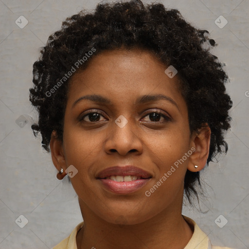 Joyful black young-adult female with short  brown hair and brown eyes