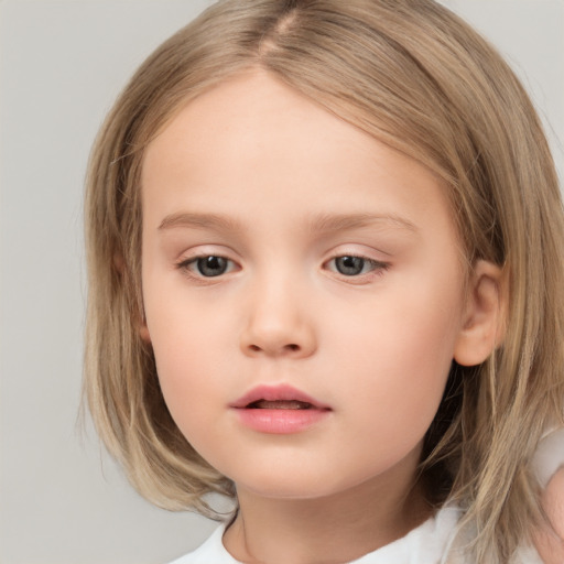 Neutral white child female with medium  brown hair and brown eyes