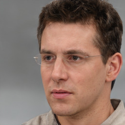 Neutral white adult male with short  brown hair and brown eyes