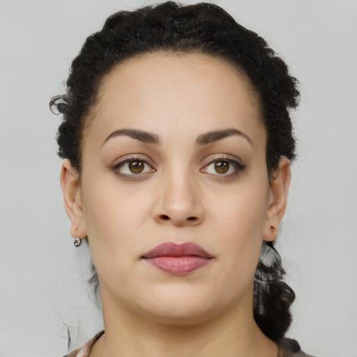 Neutral latino young-adult female with long  brown hair and brown eyes
