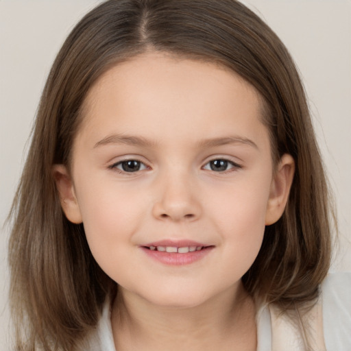 Joyful white child female with medium  brown hair and brown eyes