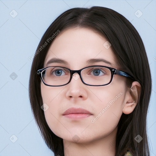 Neutral white young-adult female with long  brown hair and brown eyes