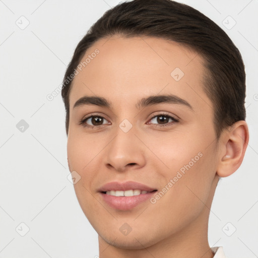 Joyful white young-adult female with short  brown hair and brown eyes