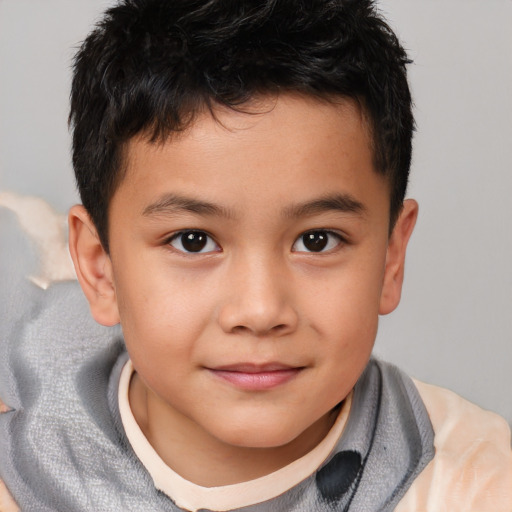 Joyful white child male with short  brown hair and brown eyes