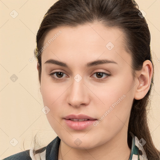 Neutral white young-adult female with medium  brown hair and brown eyes