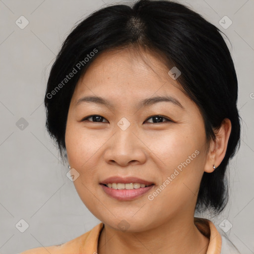 Joyful asian young-adult female with medium  brown hair and brown eyes