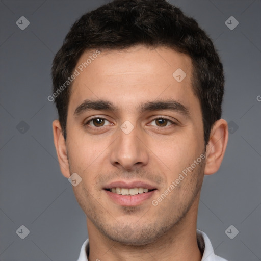 Joyful white young-adult male with short  brown hair and brown eyes