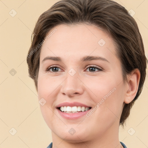 Joyful white young-adult female with medium  brown hair and brown eyes