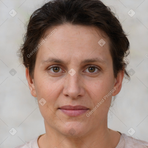 Joyful white adult female with short  brown hair and brown eyes