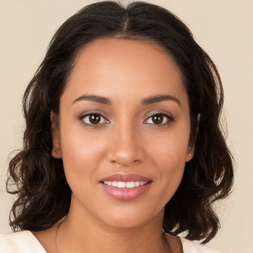 Joyful white young-adult female with medium  brown hair and brown eyes