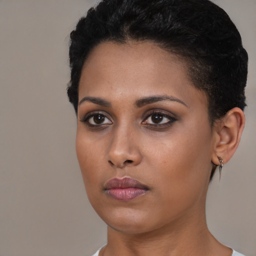 Neutral black young-adult female with short  brown hair and brown eyes