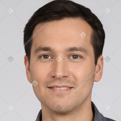 Joyful white young-adult male with short  brown hair and brown eyes