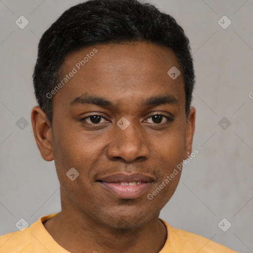 Joyful black young-adult male with short  black hair and brown eyes
