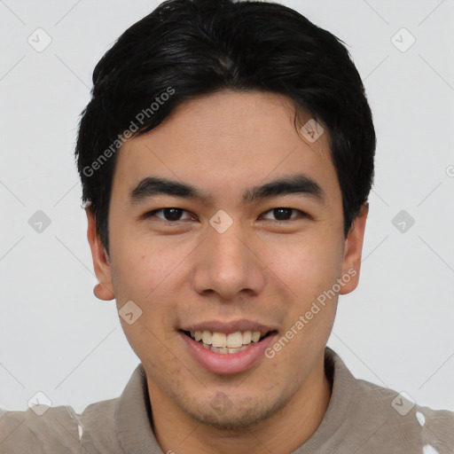 Joyful asian young-adult male with short  brown hair and brown eyes