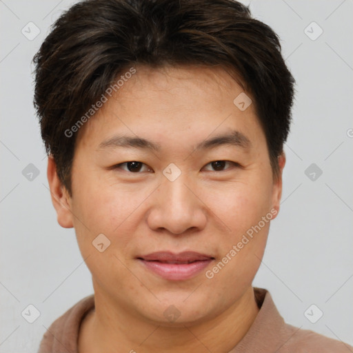 Joyful asian young-adult female with short  brown hair and brown eyes