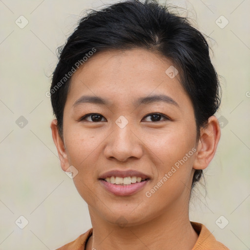 Joyful asian young-adult female with short  brown hair and brown eyes