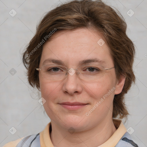 Joyful white adult female with medium  brown hair and blue eyes