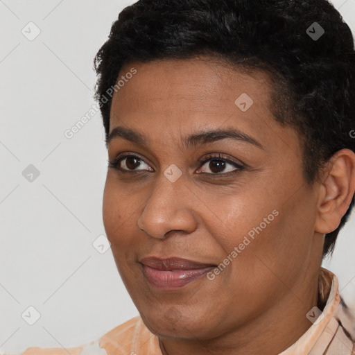 Joyful latino young-adult female with short  brown hair and brown eyes