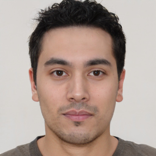 Neutral white young-adult male with short  black hair and brown eyes