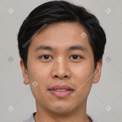 Joyful asian young-adult male with short  brown hair and brown eyes