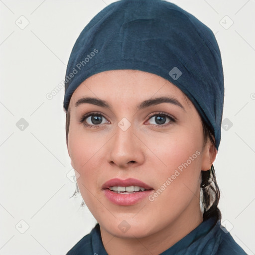 Joyful white young-adult female with medium  black hair and brown eyes