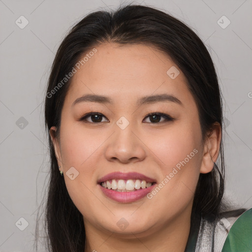 Joyful white young-adult female with long  brown hair and brown eyes