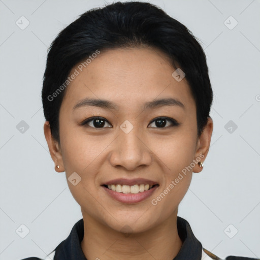 Joyful asian young-adult female with short  black hair and brown eyes