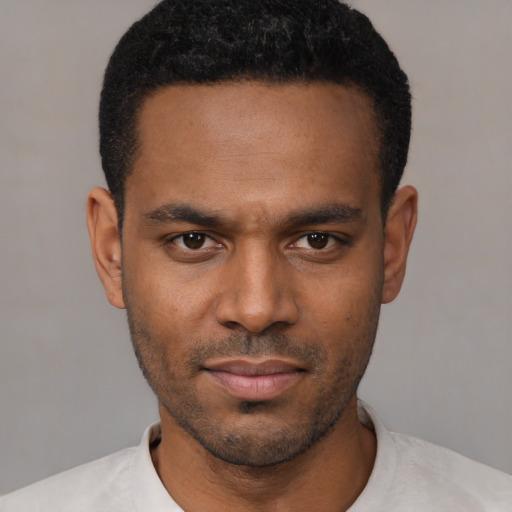 Neutral black young-adult male with short  black hair and brown eyes