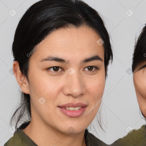 Joyful asian young-adult female with medium  brown hair and brown eyes