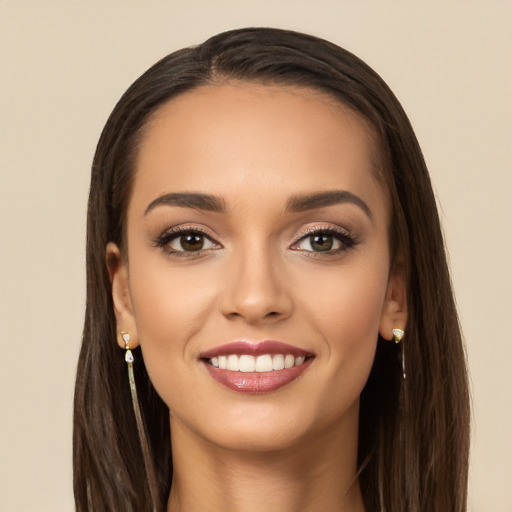 Joyful white young-adult female with long  brown hair and brown eyes