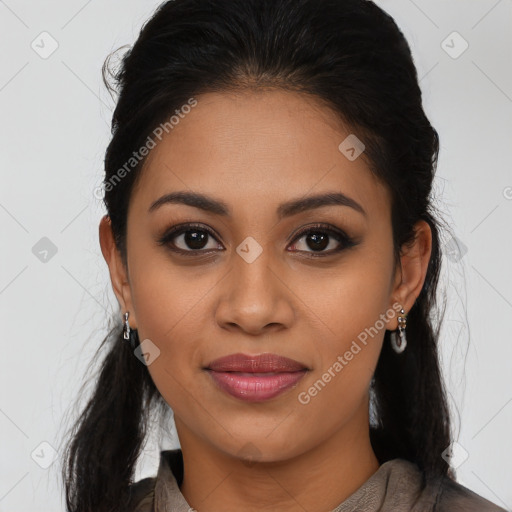 Joyful latino young-adult female with long  brown hair and brown eyes