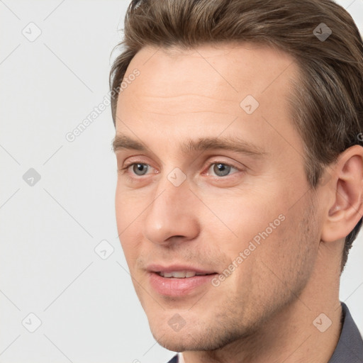 Joyful white young-adult male with short  brown hair and brown eyes